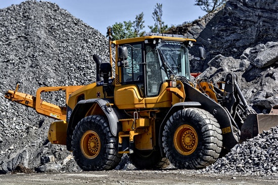 Earth moving equipment in a quarry environment